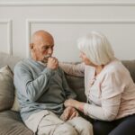 Elderly woman supporting her partner, reflecting the question, “how does dementia kill you?