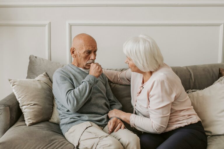 Elderly woman supporting her partner, reflecting the question, “how does dementia kill you?