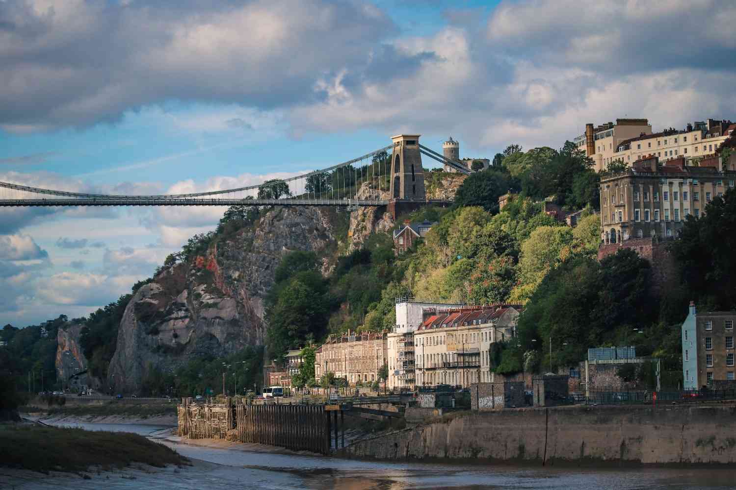 The Clifton Suspension Bridge spans the Avon Gorge in Bristol, England, showcasing its iconic design and stunning views.